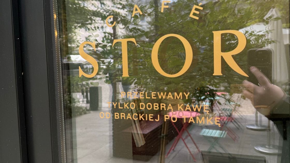 Warsaw café community post